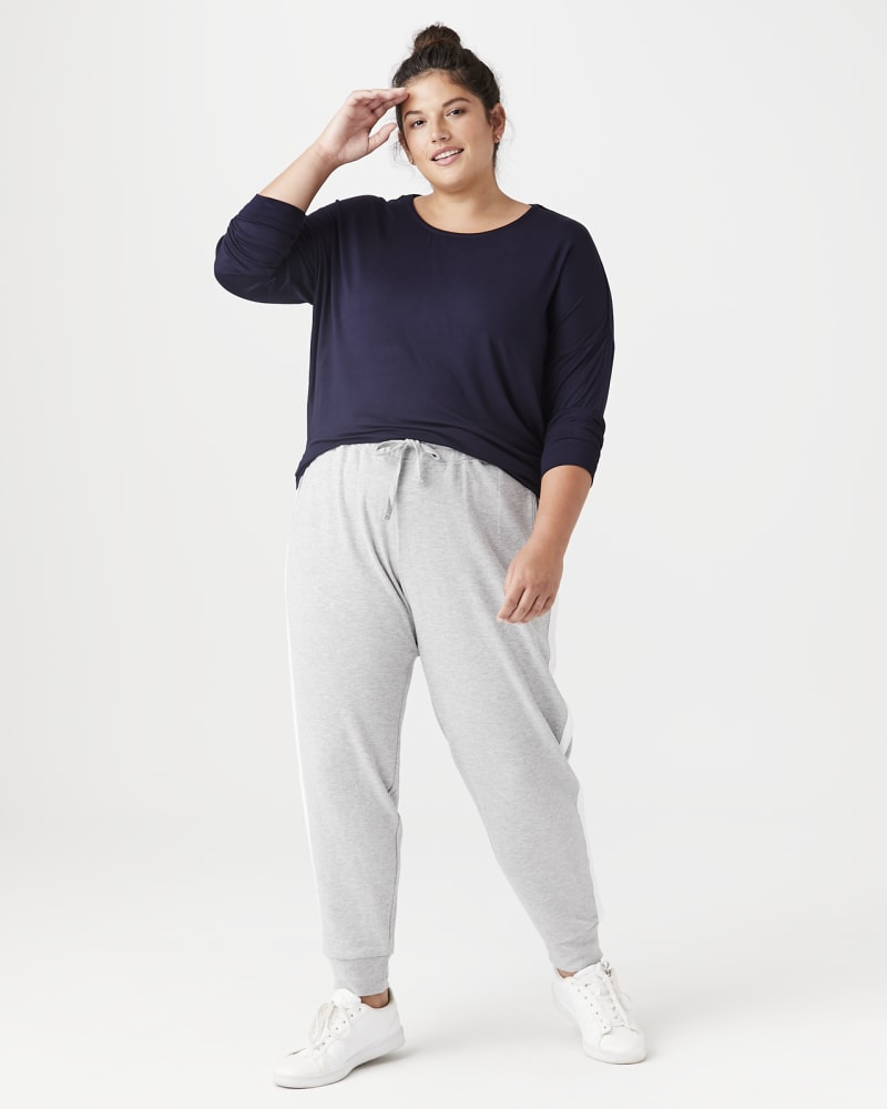 Plus size model with hourglass body shape wearing Mayflower Long-Sleeve Tee by Marc NY | Dia&Co | dia_product_style_image_id:143806